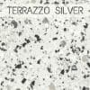 céramique effet Terrazzo avec un fond gris perle et des éléments blanc, gris et noir