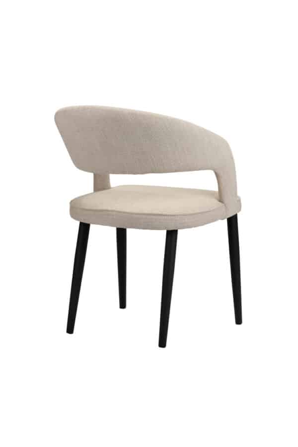 chaise confortable au design contemporain , recouverte de tissu beige, vue arrière.