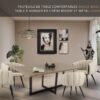 Scène 36b2 - Meubles hauts de gamme et durables suivants : table à manger en chêne massif et métal plein CANDEL, fauteuils de salle à manger confortables en tissu beige avec pieds fuselés en acier noir BREEZE BEIGE, cadres décoratifs variés et statue en bronze.
