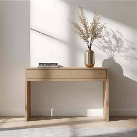 Console d’entrée en bois clair avec tiroirs, en chêne massif. Design épuré, structure solide et élégante, elle peut être fabriquée sur-mesure.
